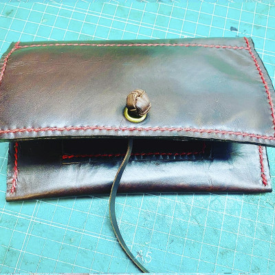 Tabaquera cierre cordel