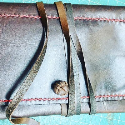 Tabaquera cierre cordel