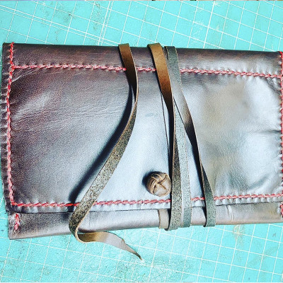 Tabaquera cierre cordel